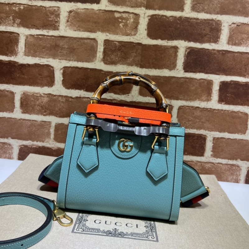 G*u*i top handle bags